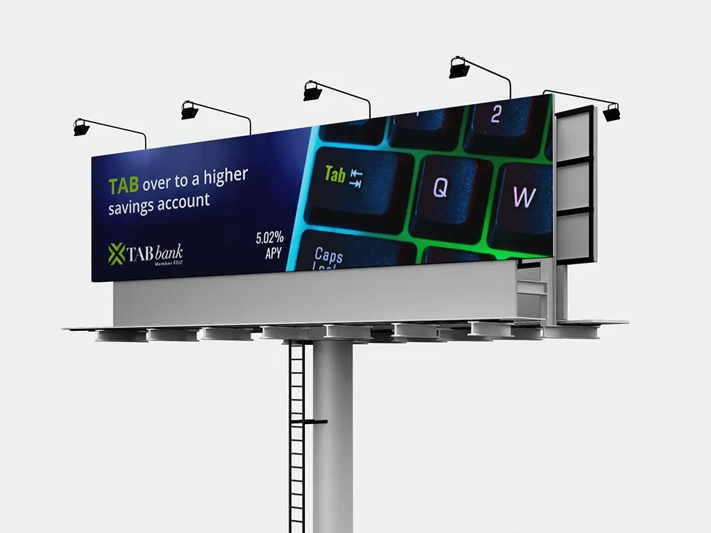 TAB Bank billboard with a glowing keyboard photo reading Tab over to a higher savings account